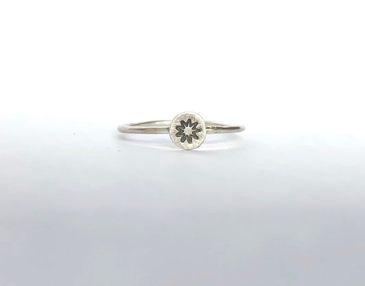 tiny nine pointed star ring